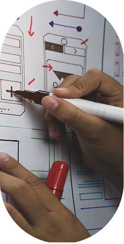 UI wireframe being marked with pen